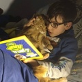 Putting Himself to Bed With His Cat
