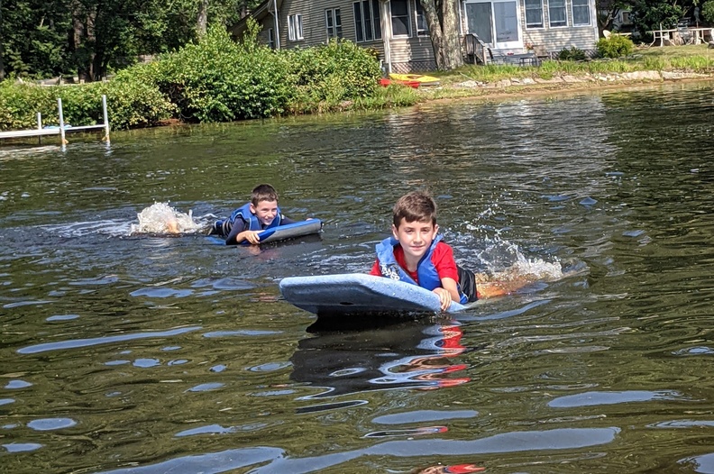 Calvin and Thomas Floating in the Boat Waves