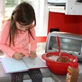Writing the Recipe for Her Zucchini Bread.JPG