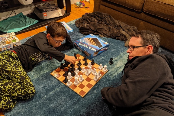 Trying to Beat Daddy at Chess