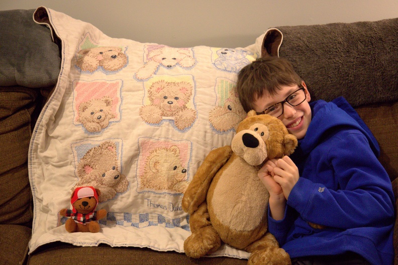 Cuddly 9 Year Old With His Bear.jpg