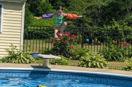 Evie Takes Flight Into the Pool