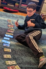 Sorting His Football Cards