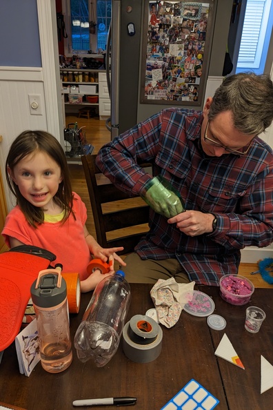 Building Her Water Rocket With Daddy