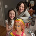 Practicing Barbie Hair With Her Aunt.jpg