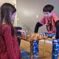 Talking His Sister Through Chess.jpg
