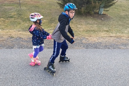 Towing His Sister Up the Street