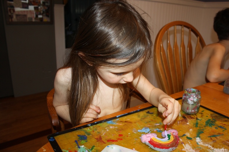 Focused on Her Rainbow Painting.JPG