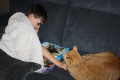 Reading With His Cat