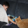 Reading With His Cat.JPG