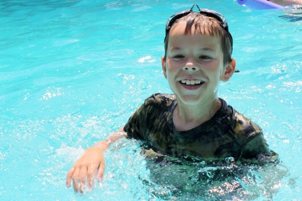 Smiling Cooper In the Pool