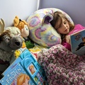 Reading In Her Cozy Nest.jpg