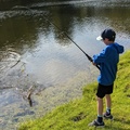 Reeling In His First Fish