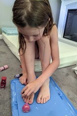 Painting Her Toes