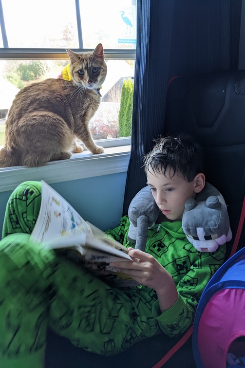 Reading With His Kitty