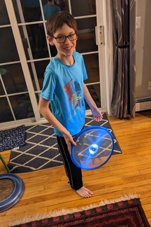 His Frisbee Glows