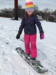 Working on Her Snowboard Skills